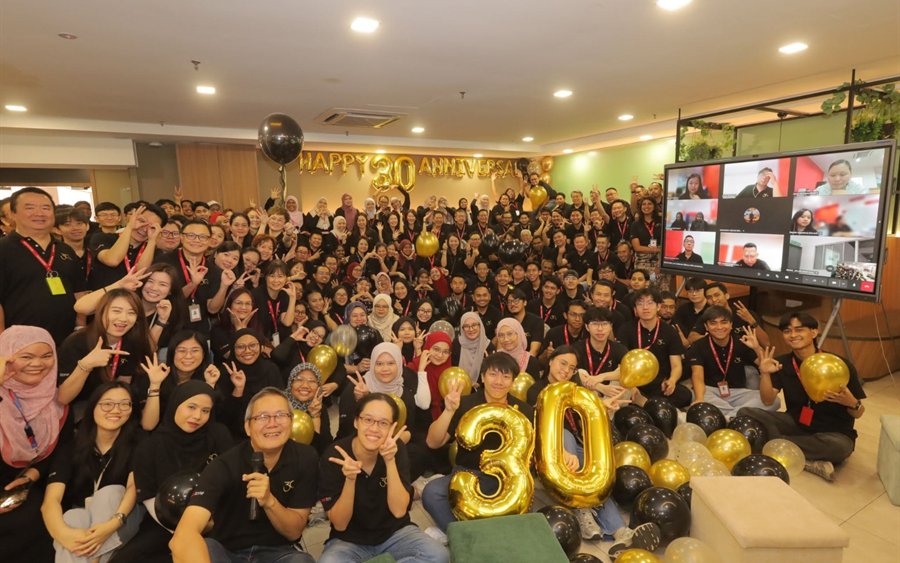 REDtone team celebrating 30 years